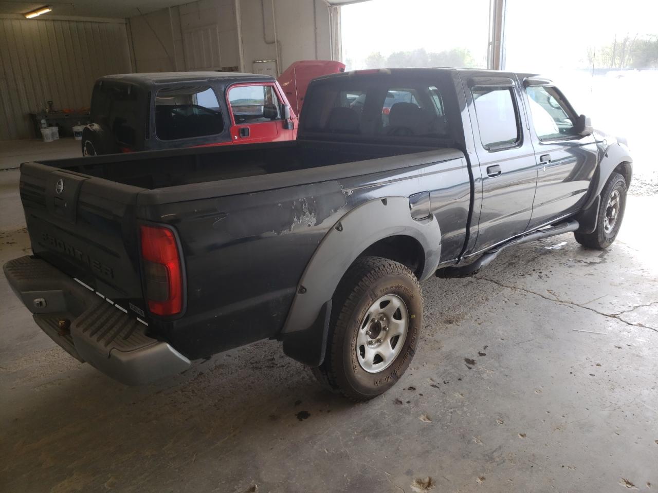 Photo 4 from auction – 2003 NISSAN FRONTIER C with VIN 1N6ED29Y83C417235