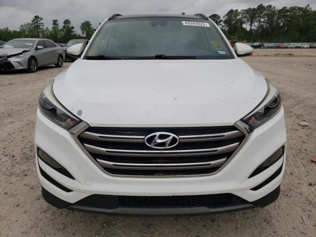 Photo 9 from auction – 2016 HYUNDAI TUCSON LIM with VIN KM8J33A24GU050329