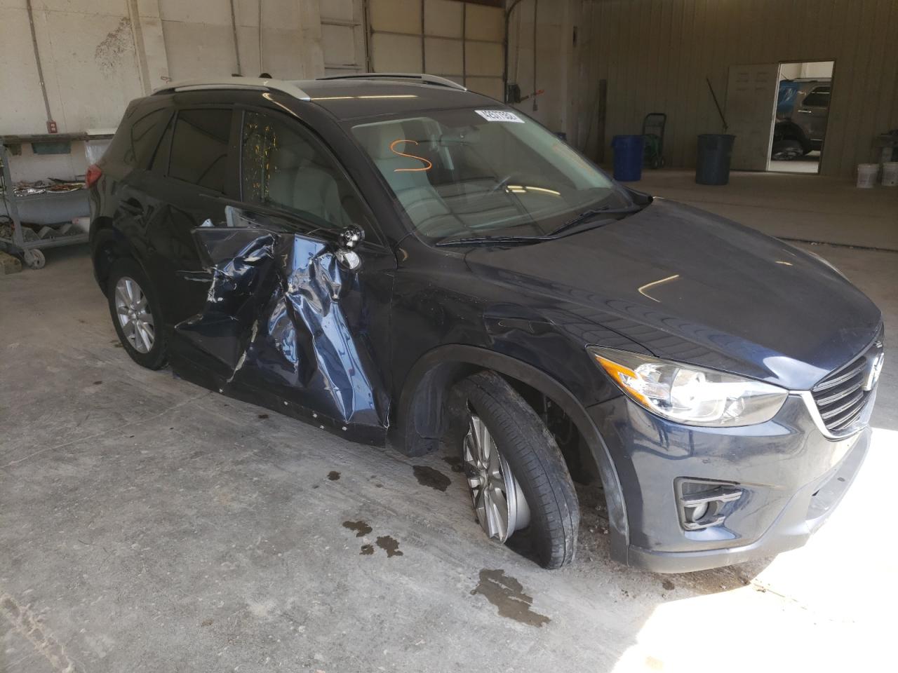 Photo 1 from auction – 2016 MAZDA CX-5 TOURI with VIN JM3KE2CY0G0759708