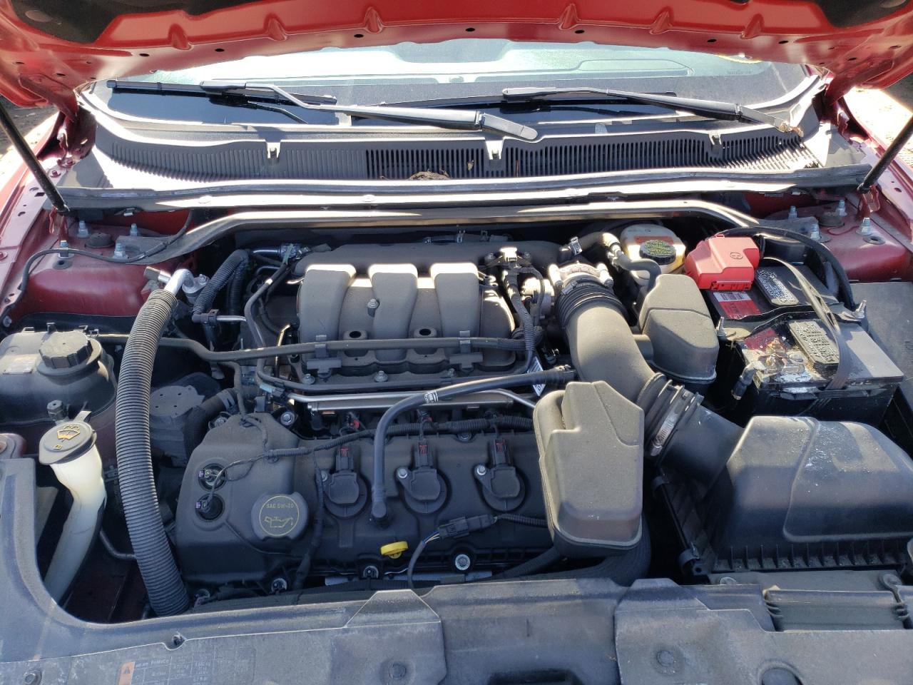 Photo 7 from auction – 2016 FORD TAURUS SEL with VIN 1FAHP2H89GG131228