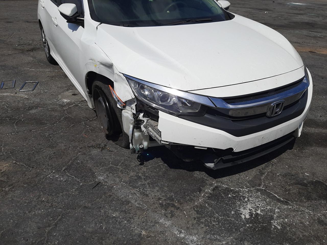Photo 9 from auction – 2016 HONDA CIVIC LX with VIN 19XFC2E54GE022215