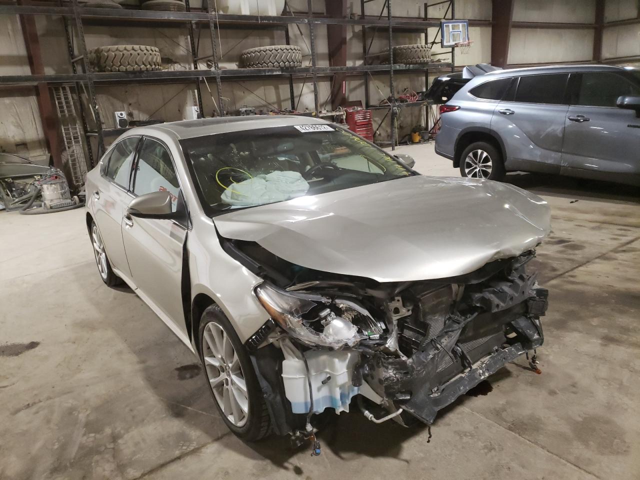 TOYOTA AVALON BAS 2014 with VIN 4T1BK1EB9EU100600 - Photo from auction