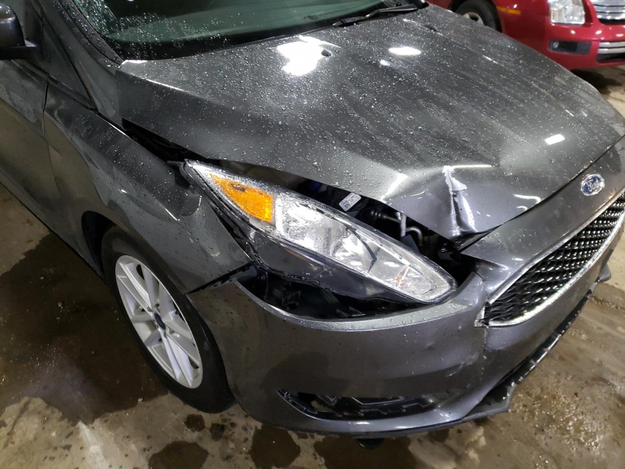 Photo 9 from auction – 2018 FORD FOCUS SE with VIN 1FADP3F2XJL267045