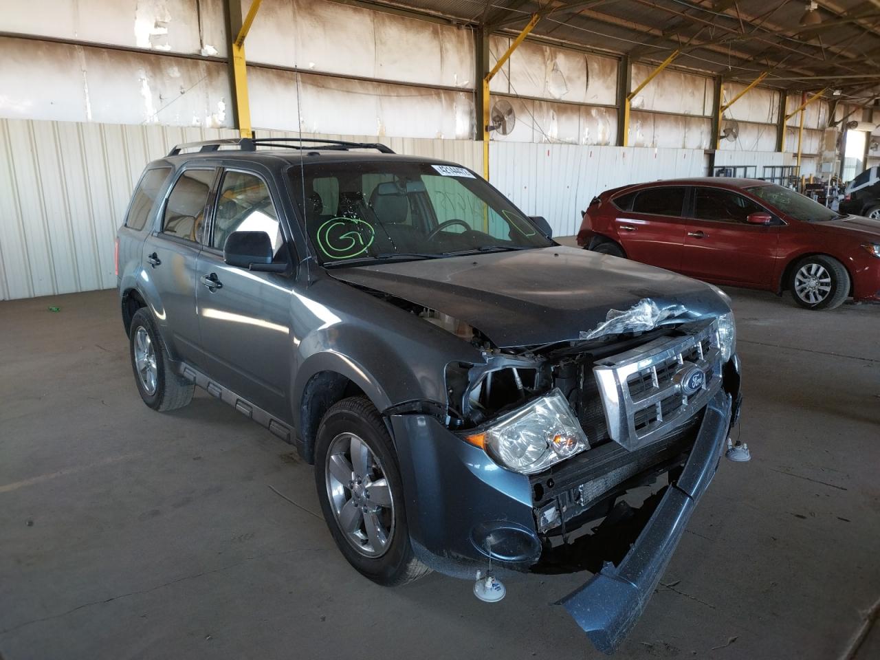 FORD ESCAPE LIM 2011 with VIN 1FMCU9EG8BKC10800 - Photo from auction