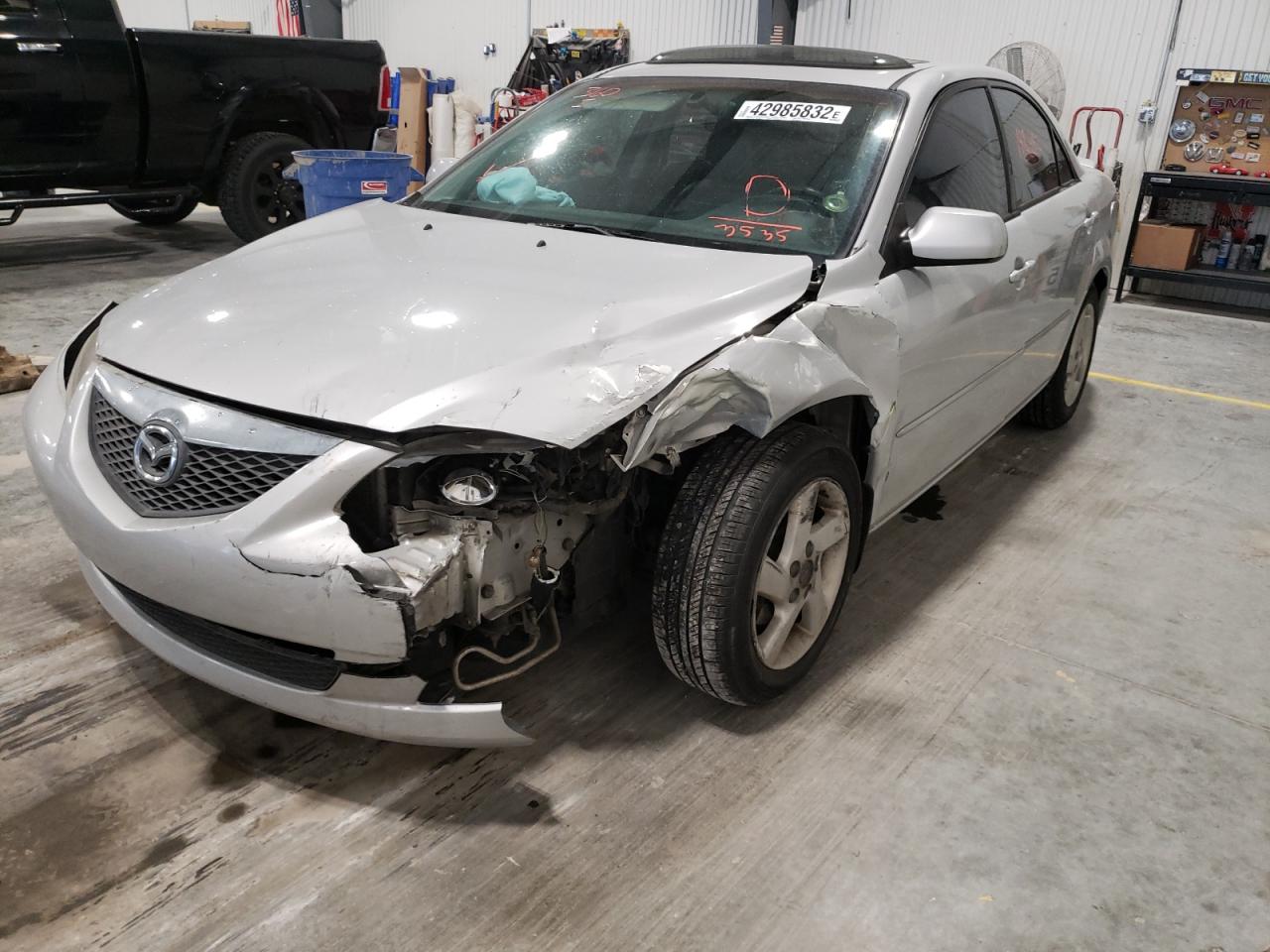 Photo 2 from auction – 2003 MAZDA 6 S with VIN 1YVFP80D335M23535