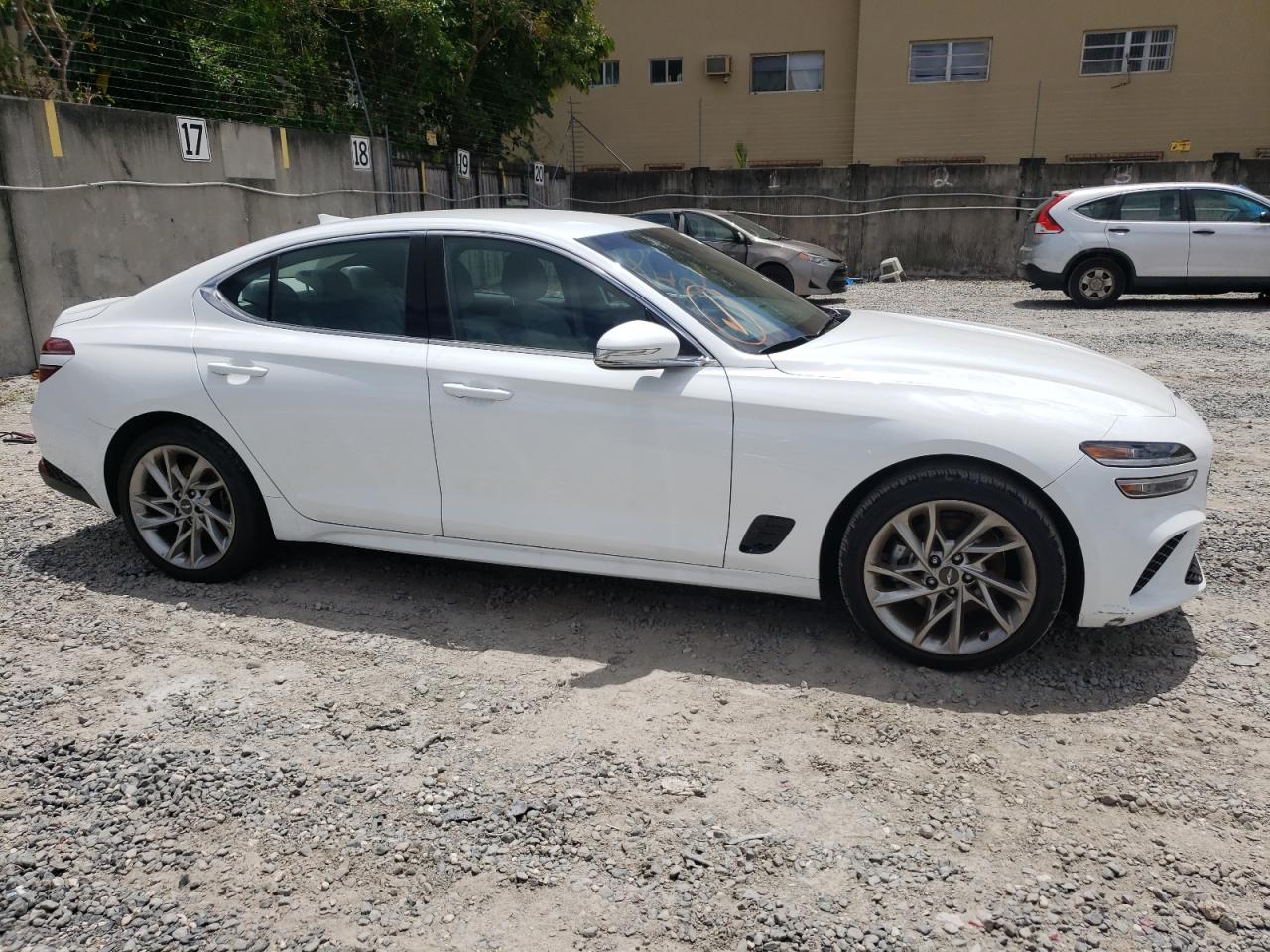 Foto 9 de la subasta – 2022 GENESIS G70 BASE con VIN KMTG34TA4NU093351