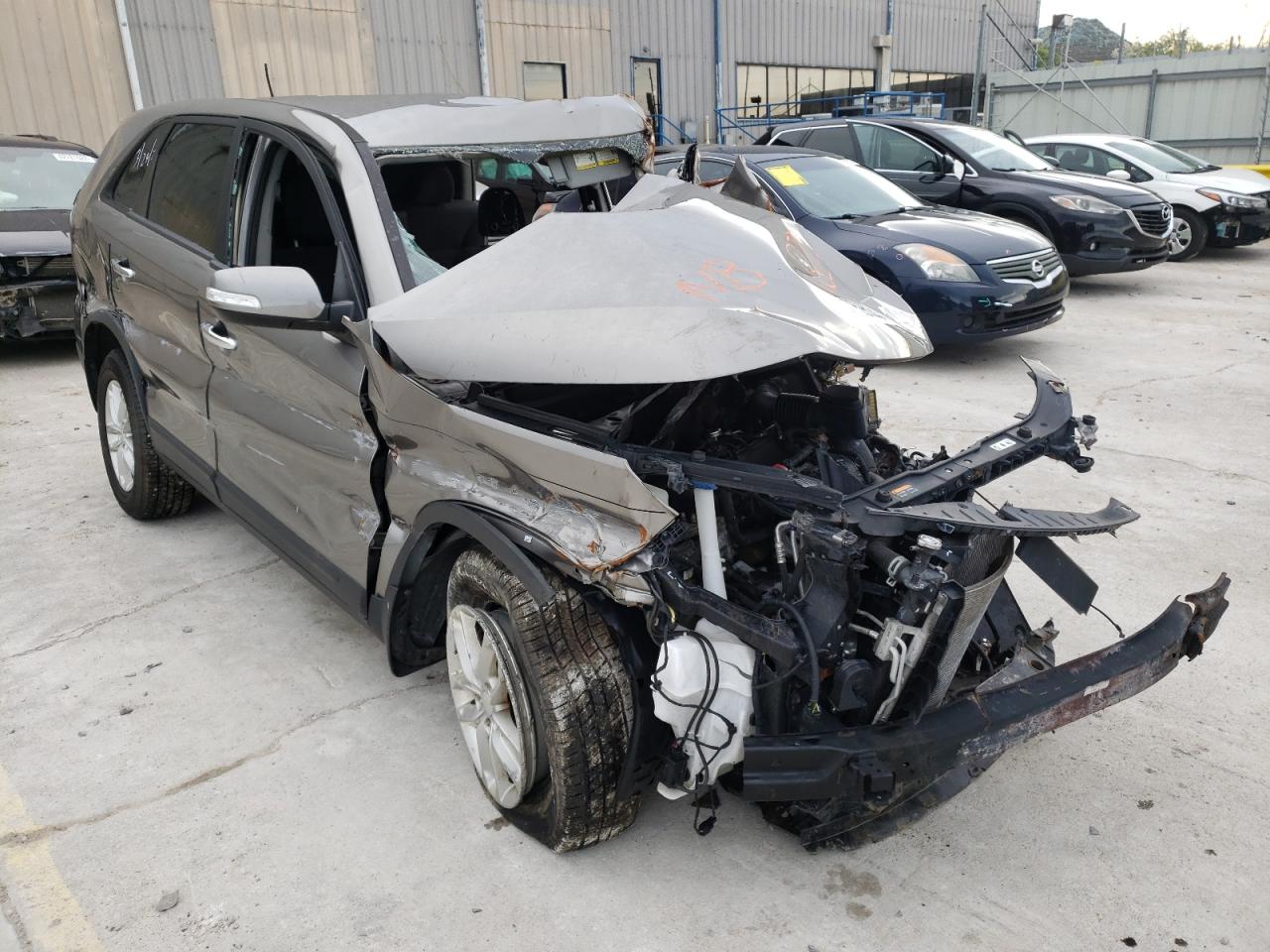 KIA SORENTO LX 2015 with VIN 5XYKT3A67FG631397 - Photo from auction