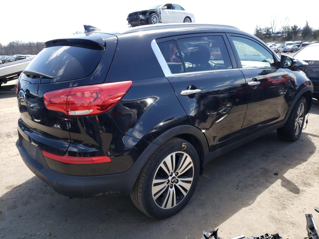 Photo 4 from auction – 2015 KIA SPORTAGE E with VIN KNDPCCAC1F7699834