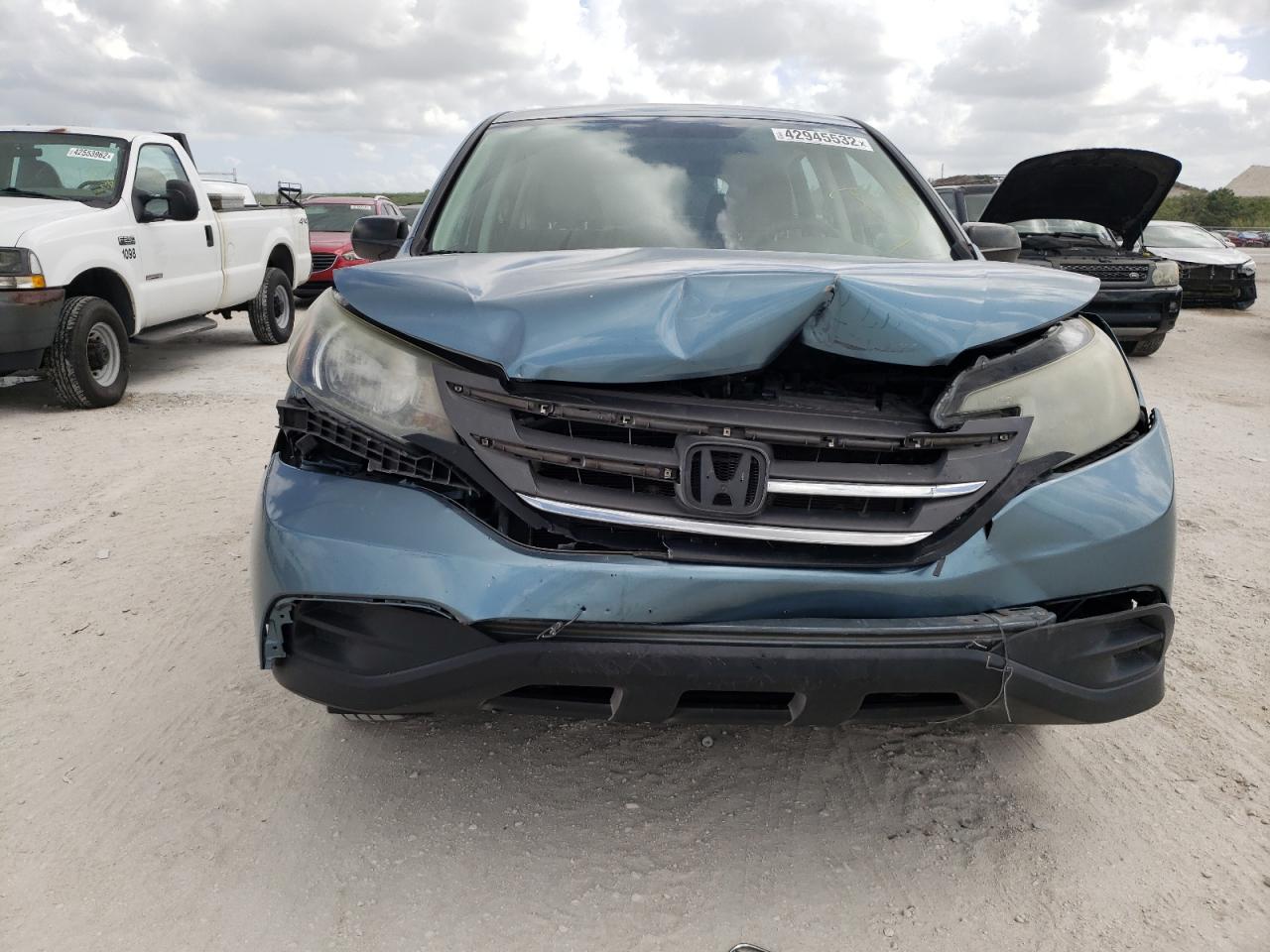 Photo 9 from auction – 2014 HONDA CR-V LX with VIN 5J6RM4H35EL006703
