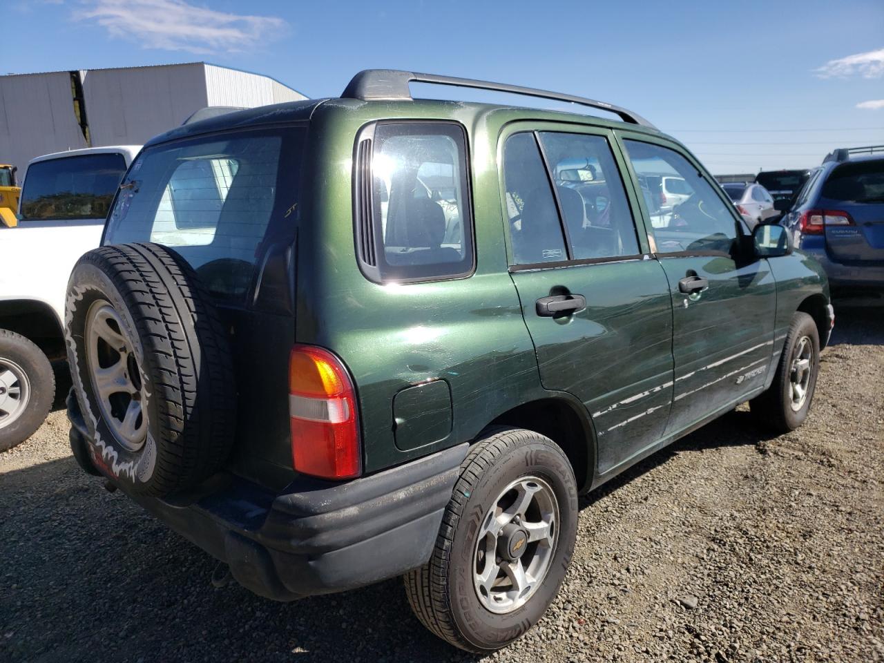 Photo 4 from auction – 1999 CHEVROLET TRACKER with VIN 2CNBJ13C9X6902502