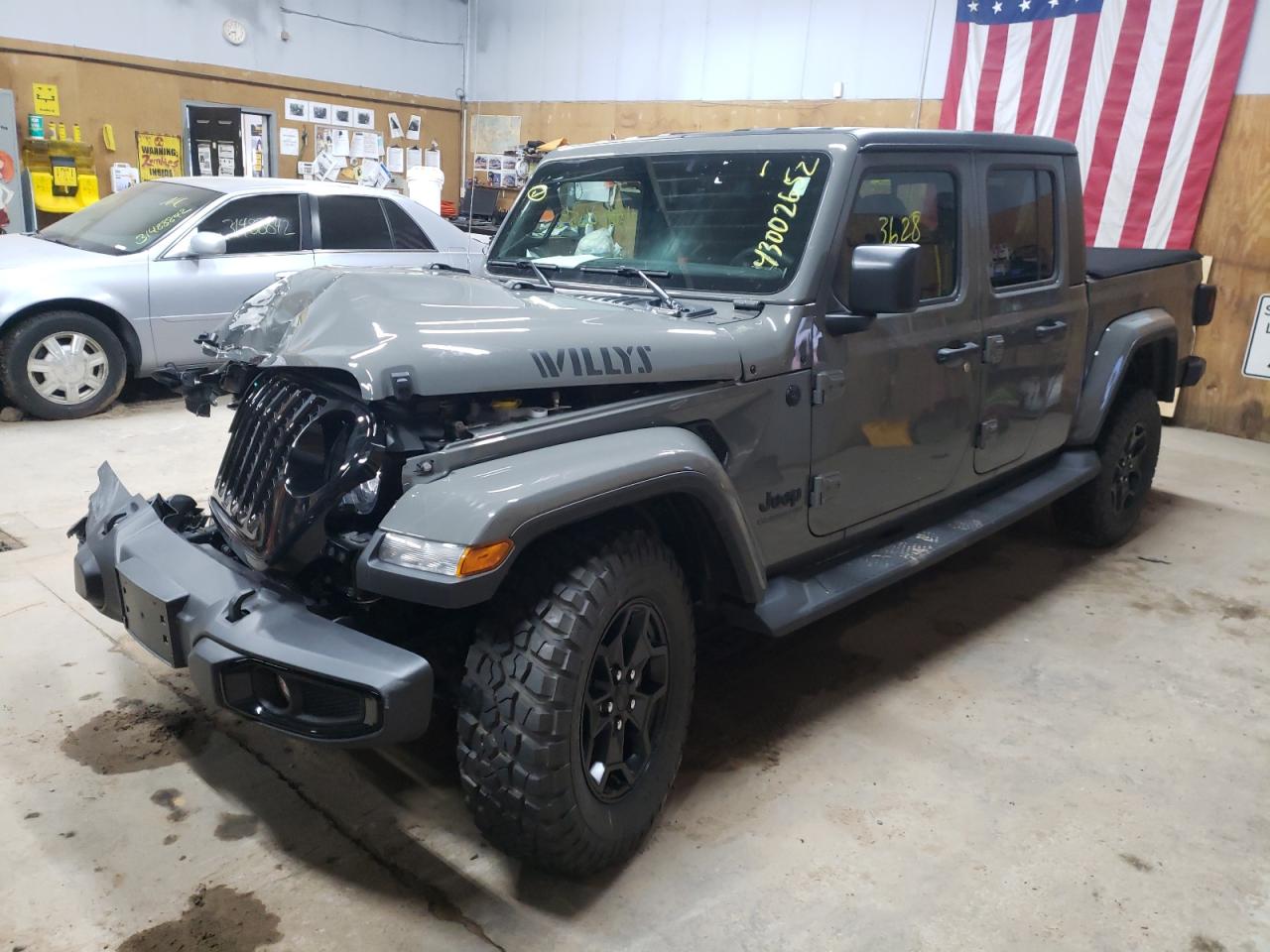 Photo 2 from auction – 2021 JEEP GLADIATOR with VIN 1C6HJTAG4ML543828