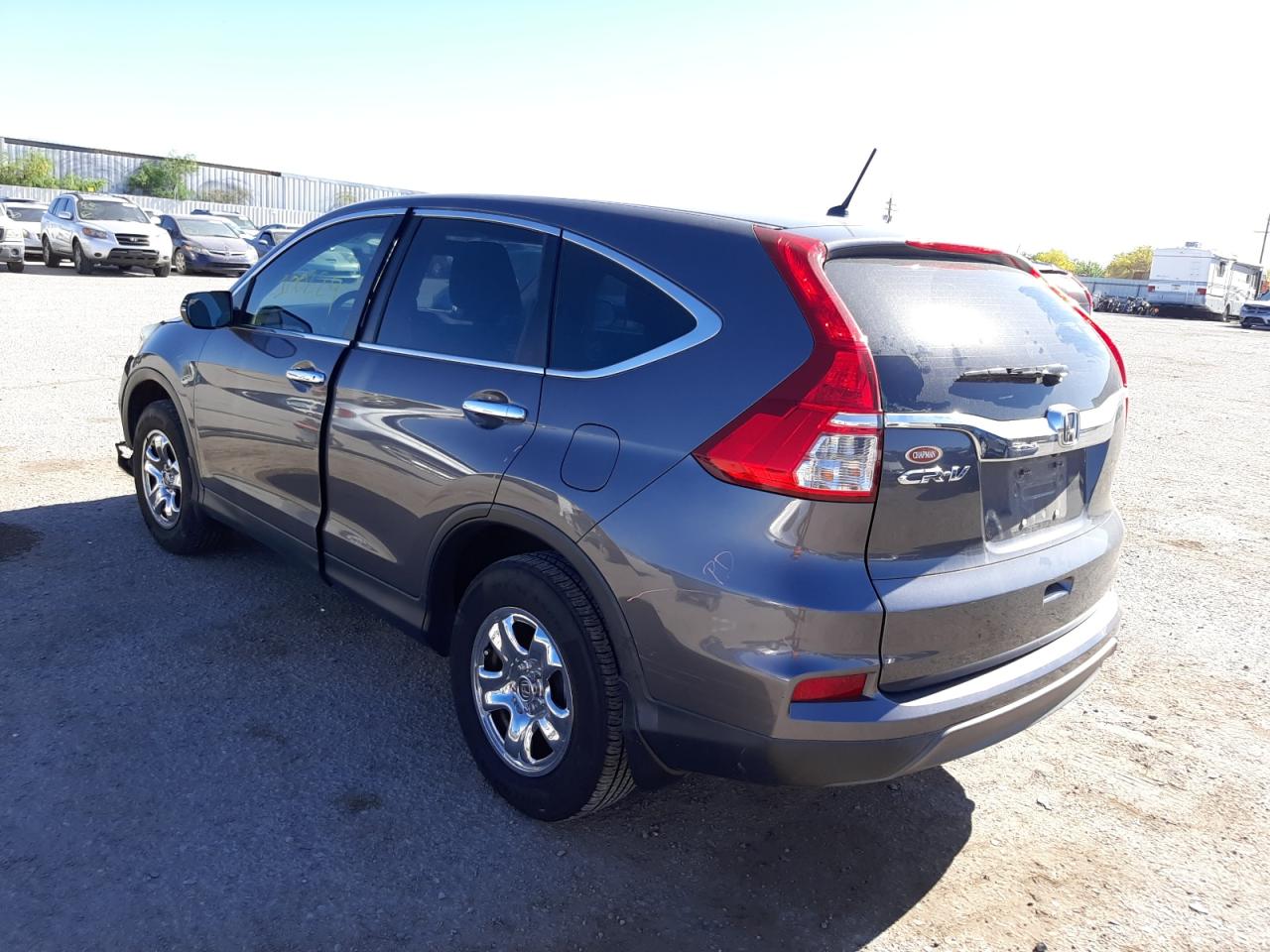 Photo 3 from auction – 2015 HONDA CR-V LX with VIN 3CZRM3H31FG707344