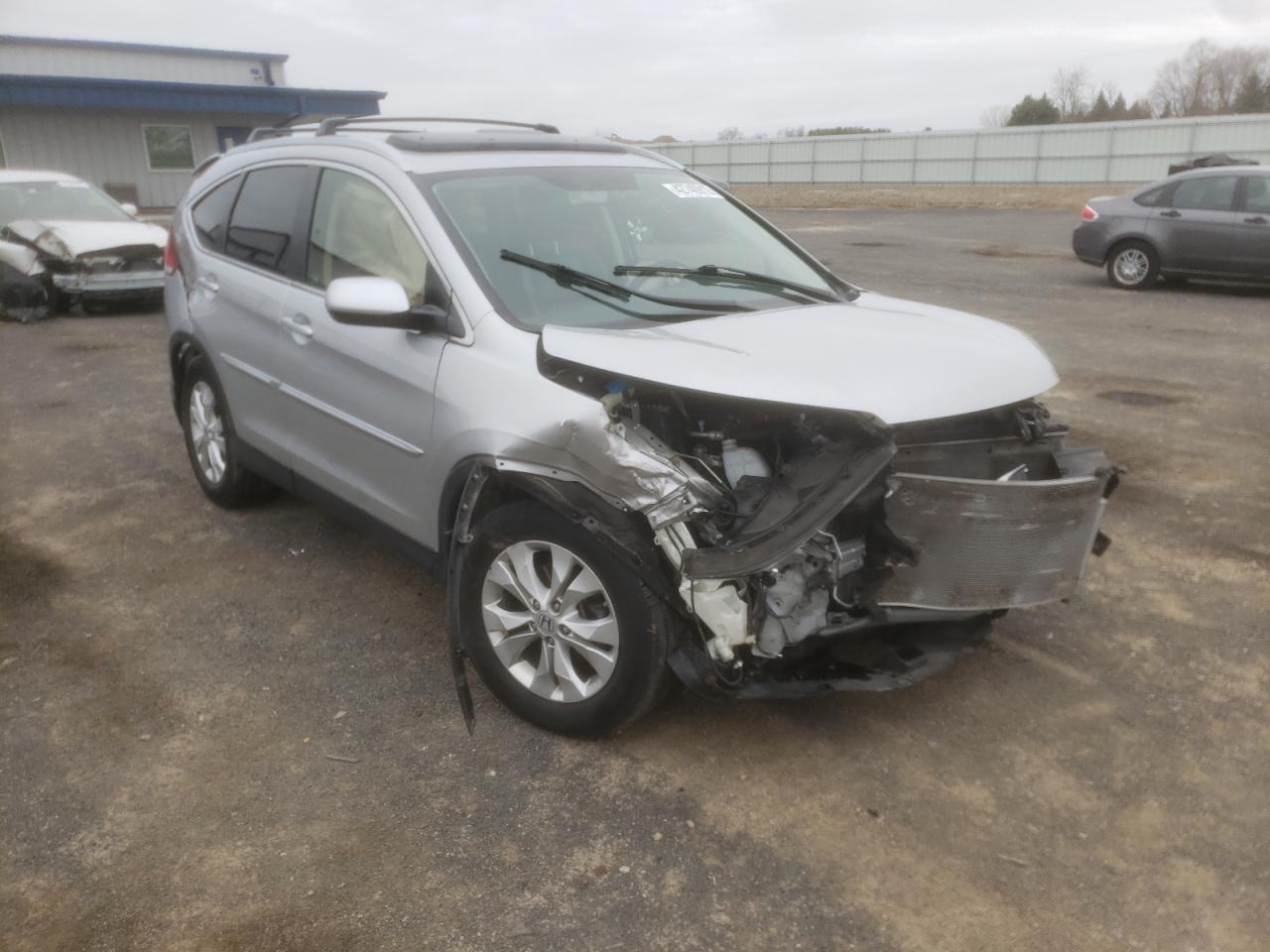 HONDA CR-V EXL 2012 with VIN JHLRM4H79CC013033 - Photo from auction