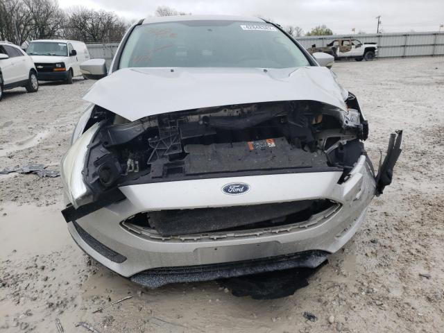 Photo 9 from auction – 2015 FORD FOCUS SE with VIN 1FADP3F24FL349988