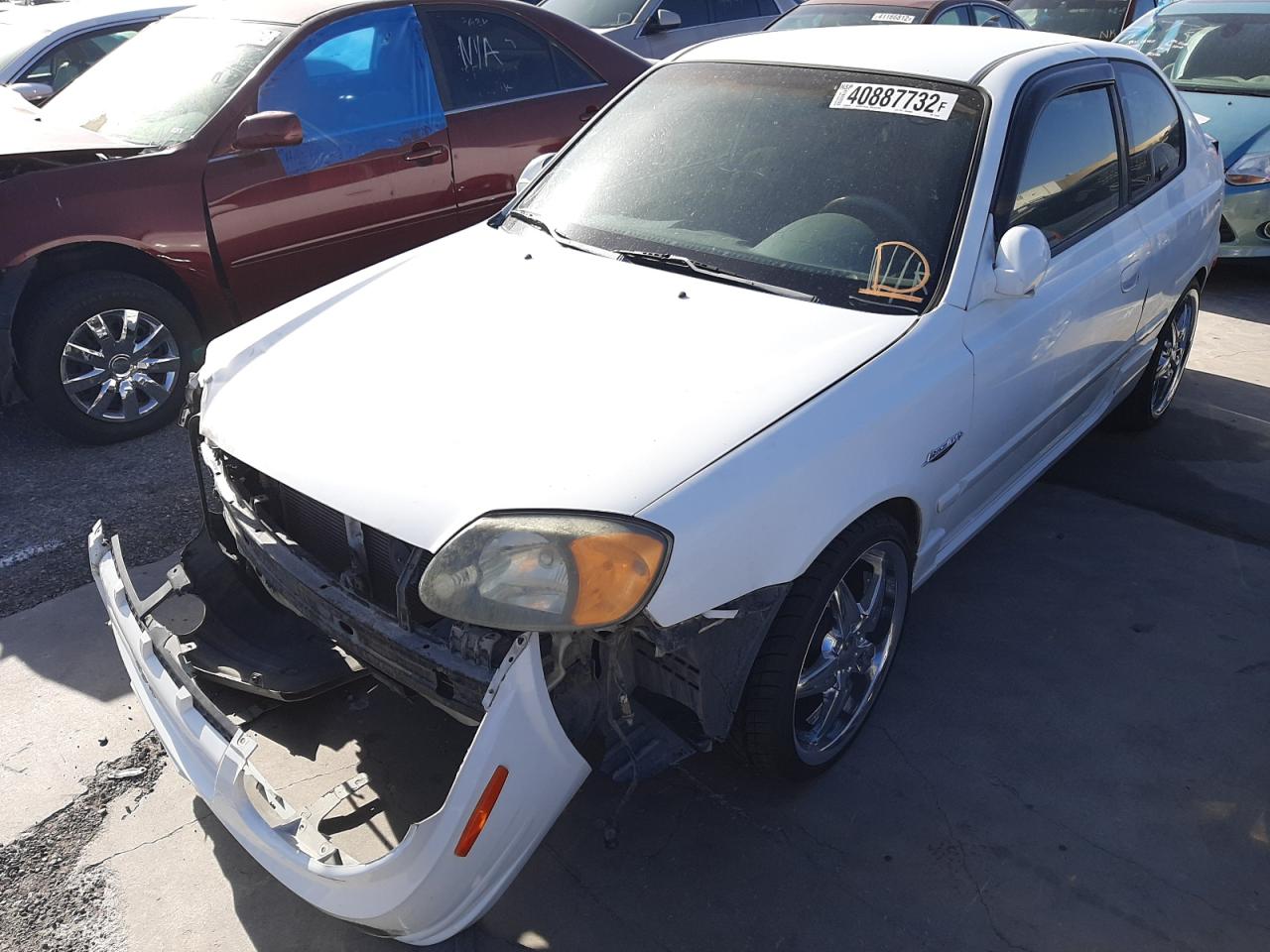Photo 2 from auction – 2003 HYUNDAI ACCENT GL with VIN KMHCG35C63U255449