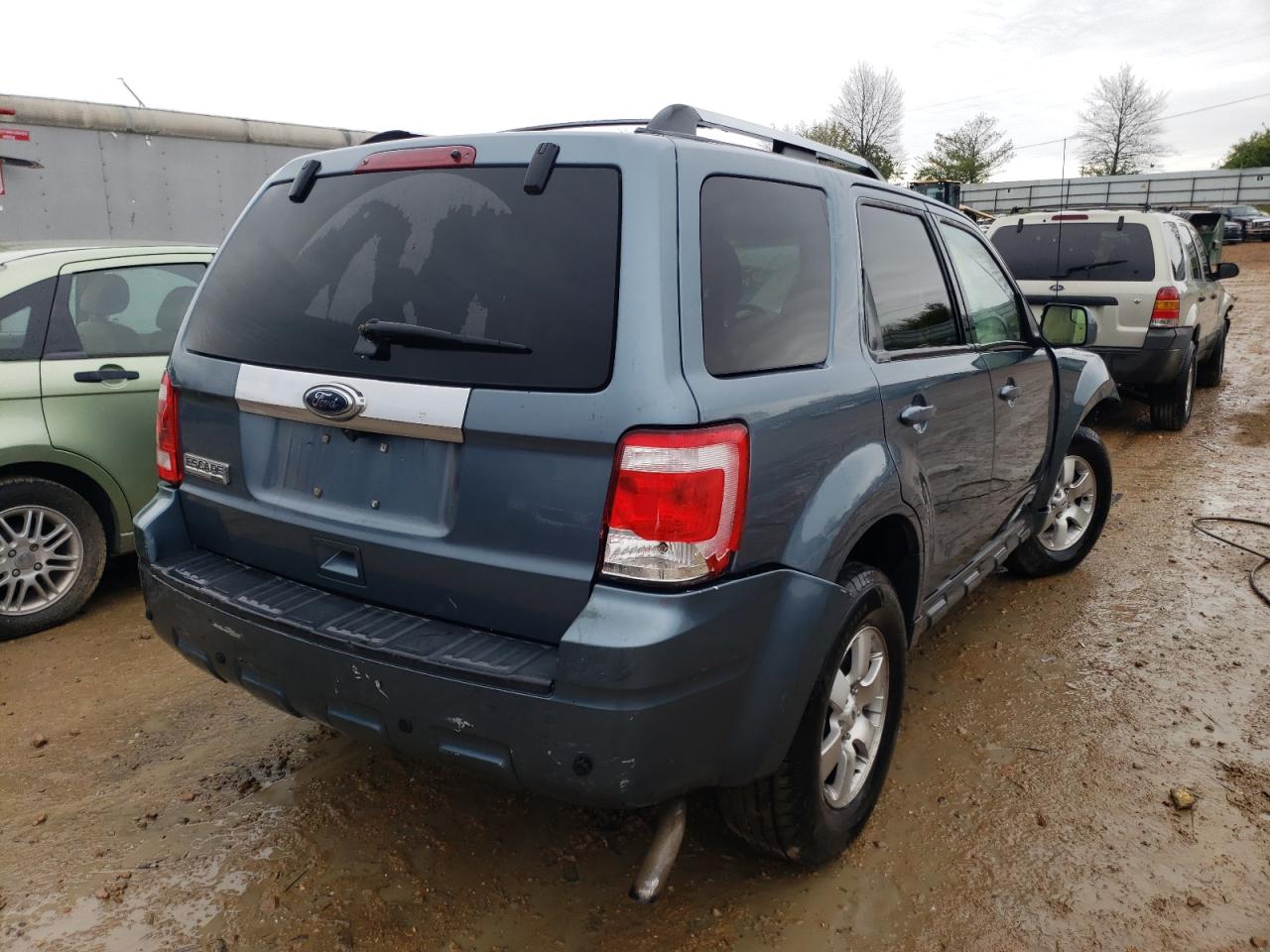 Photo 4 from auction – 2010 FORD ESCAPE LIM with VIN 1FMCU0E72AKA29542