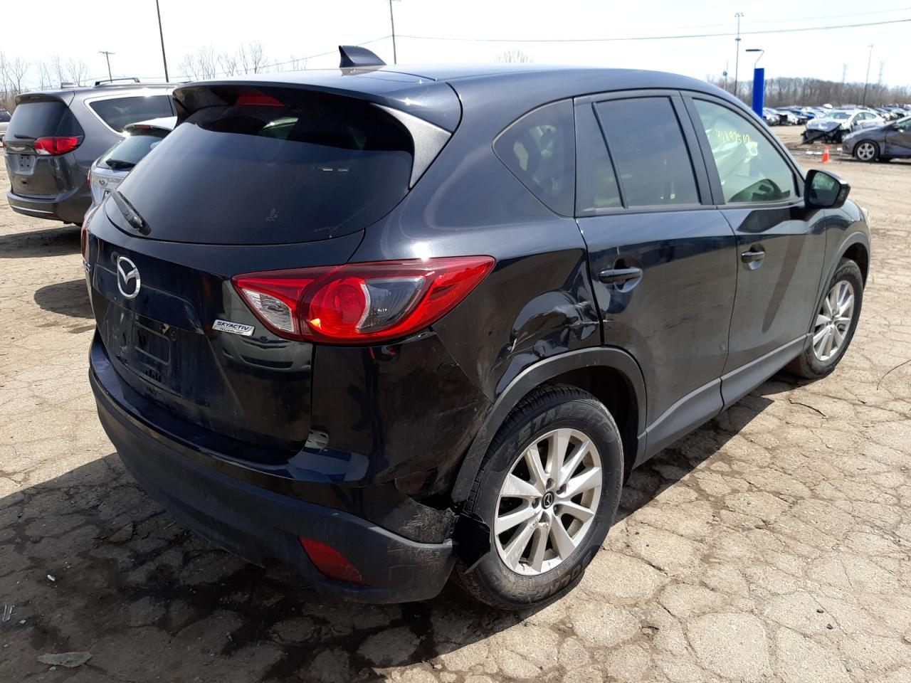 Photo 4 from auction – 2014 MAZDA CX-5 TOURI with VIN JM3KE2CY4E0323649