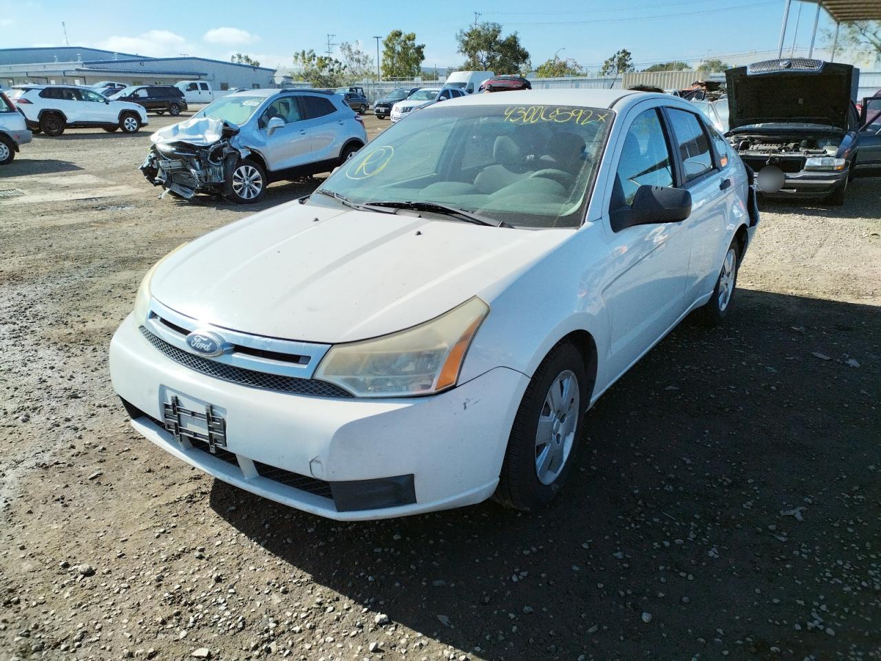 Photo 2 from auction – 2011 FORD FOCUS S with VIN 1FAHP3EN8BW117979