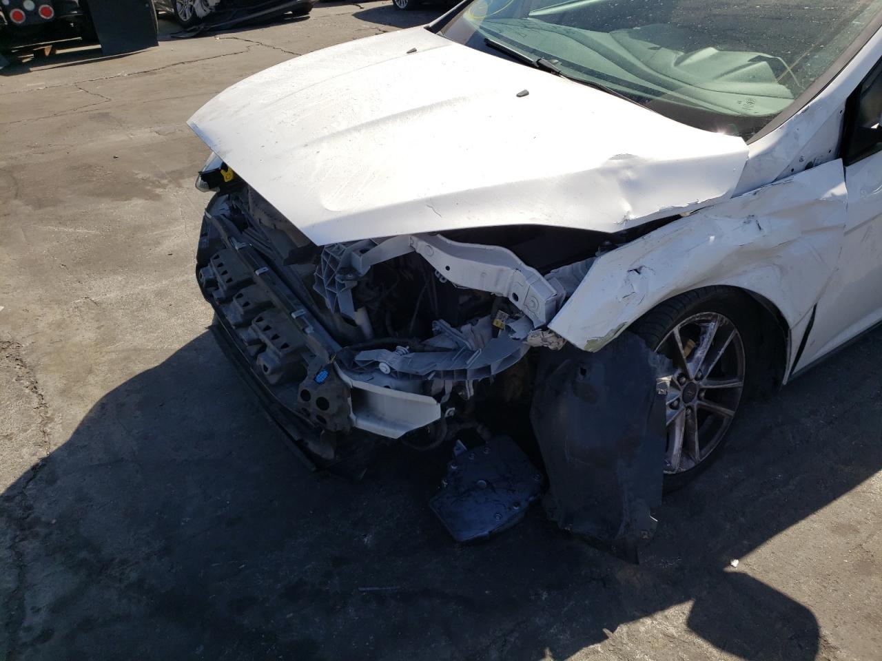 Photo 9 from auction – 2015 FORD FOCUS SE with VIN 1FADP3F22FL261876