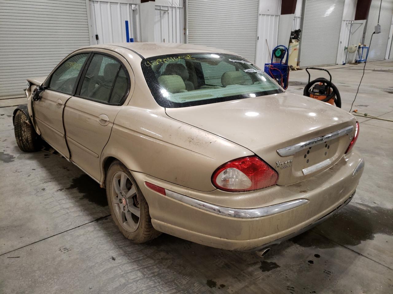 Photo 3 from auction – 2004 JAGUAR X-TYPE 2.5 with VIN SAJEB52D44XD74643