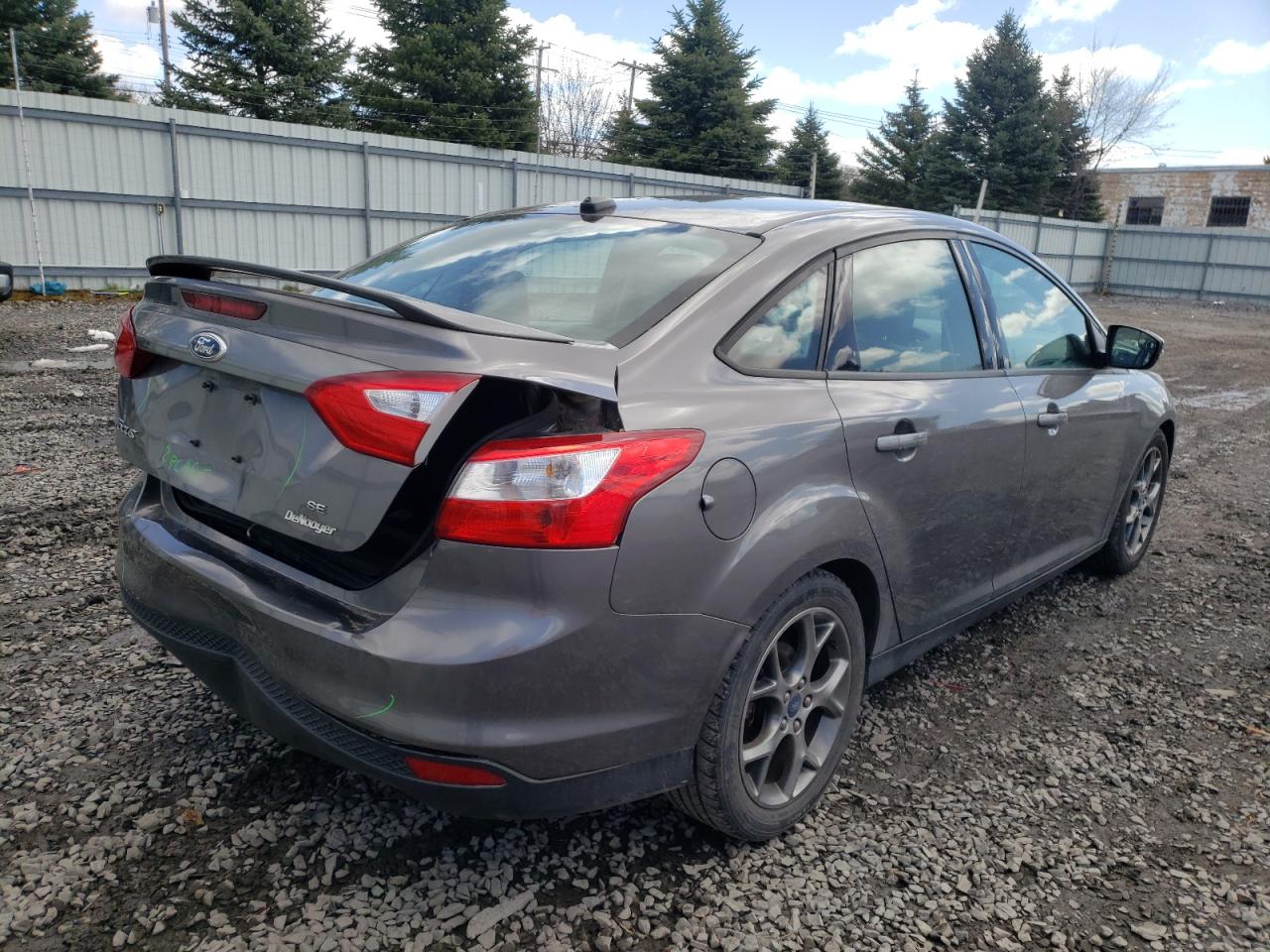 Foto 4 de la subasta – 2014 FORD FOCUS SE con VIN 1FADP3F26EL215269