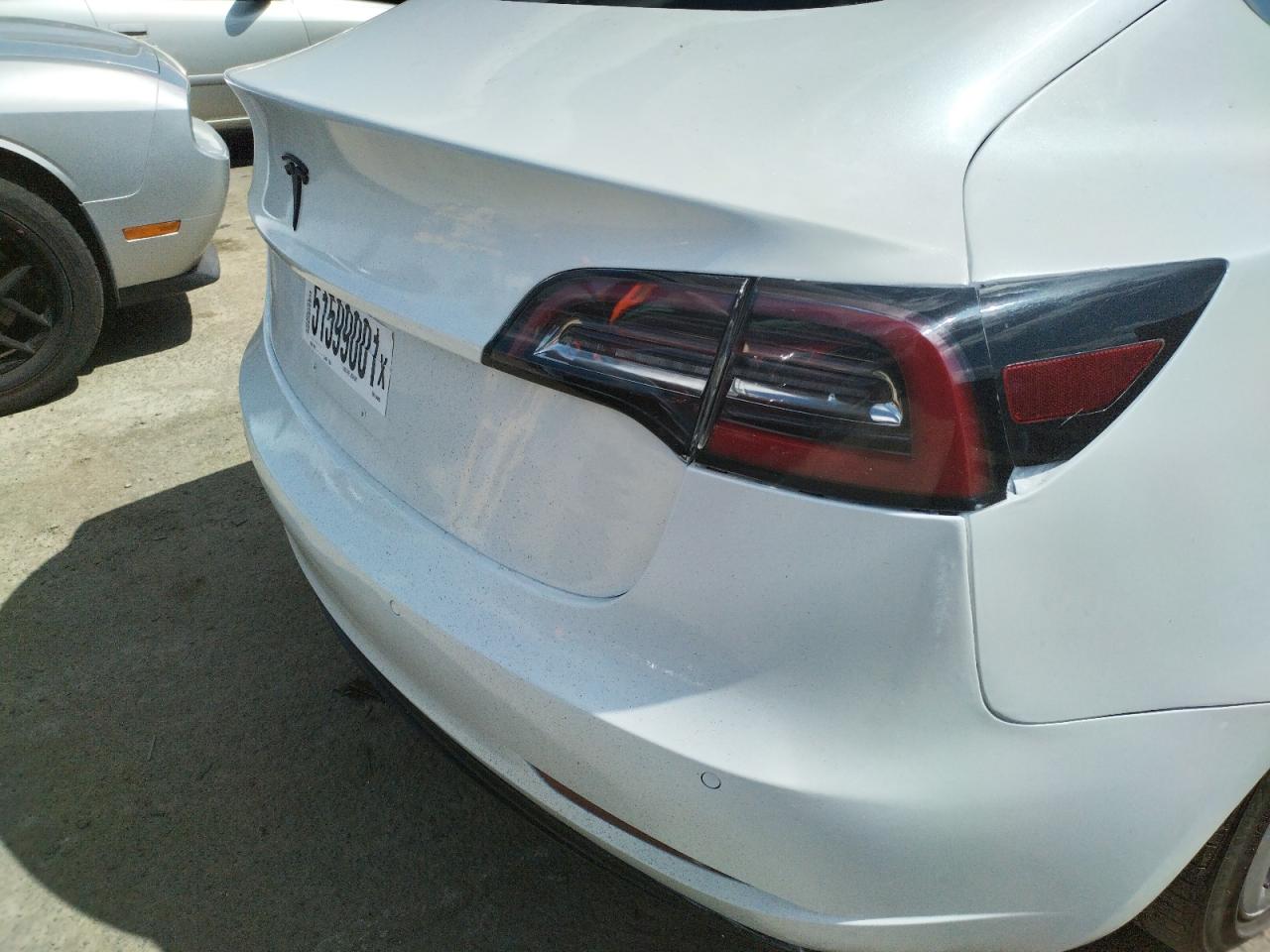 Photo 9 from auction – 2020 TESLA MODEL 3 with VIN 5YJ3E1EAXLF644990