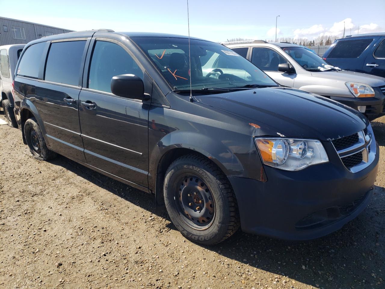 DODGE GRAND CARA 2011 with VIN 2D4RN4DG2BR762247 - Photo from auction