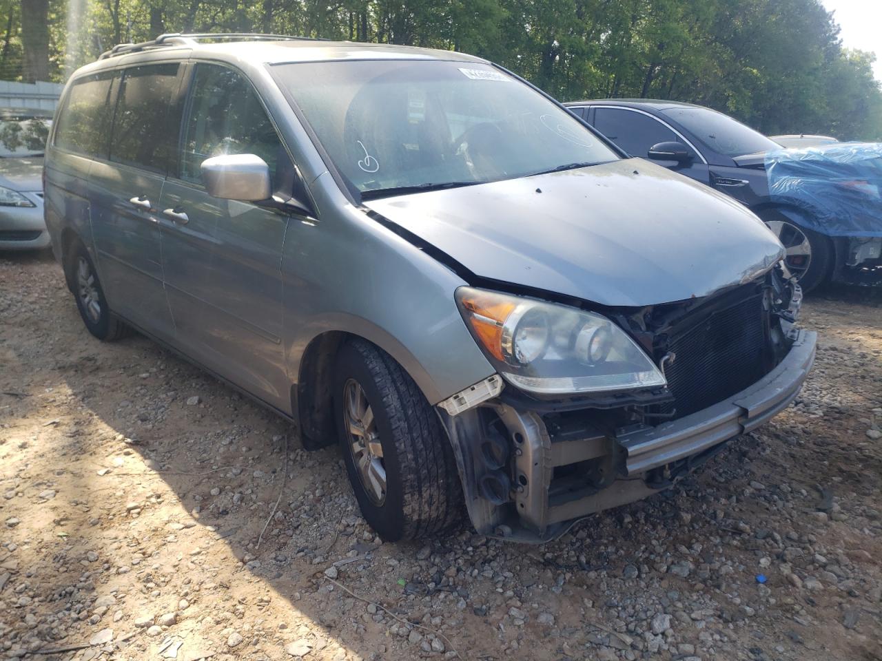 HONDA ODYSSEY EX 2010 with VIN 5FNRL3H75AB103449 - Photo from auction