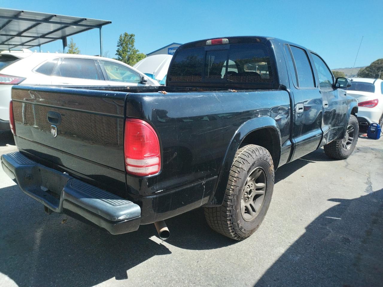 Photo 4 from auction – 2004 DODGE DAKOTA QUA with VIN 1D7HL38K04S766408