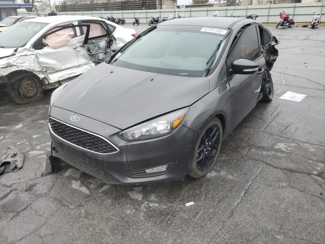 Photo 2 from auction – 2016 FORD FOCUS SE with VIN 1FADP3F23GL275335