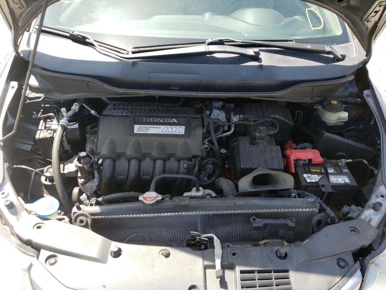 Photo 7 from auction – 2010 HONDA INSIGHT with VIN JHMZE2H74AS030211