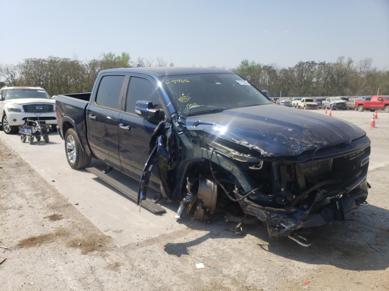 RAM 1500 LARAM 2021 with VIN 1C6SRFJTXMN699616 - Photo from auction
