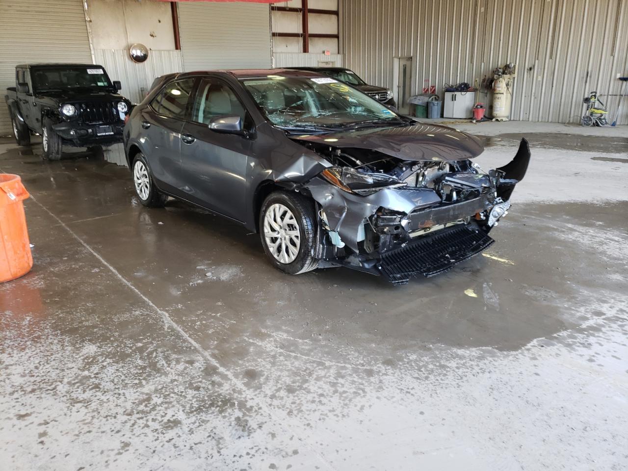 TOYOTA COROLLA L 2017 with VIN 5YFBURHE6HP617499 - Photo from auction