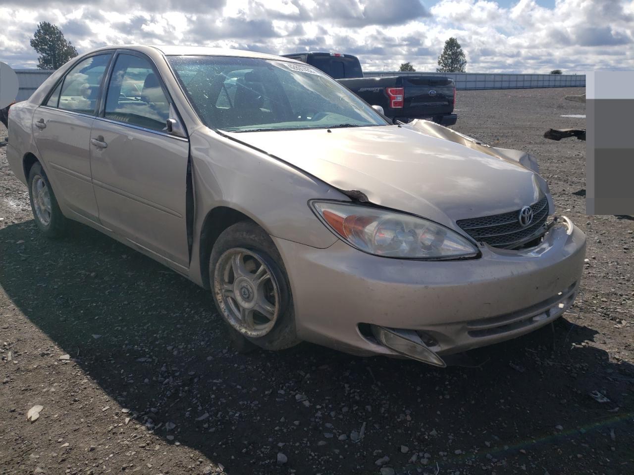 TOYOTA CAMRY LE 2004 with VIN JTDBE32K540262368 - Photo from auction