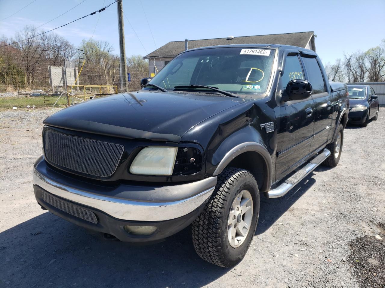 Photo 2 from auction – 2002 FORD F150 SUPER with VIN 1FTRW08L02KE26640