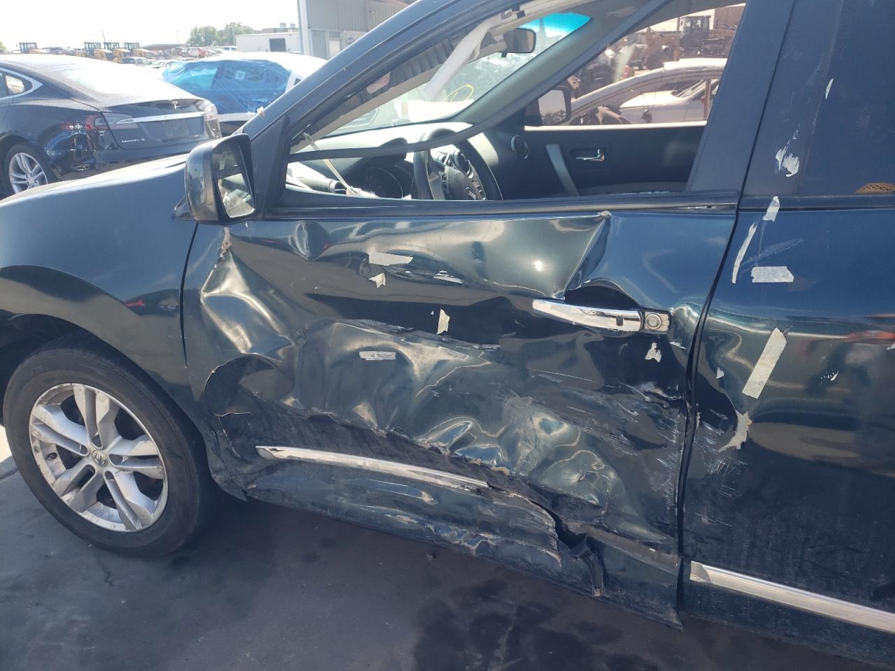 Photo 9 from auction – 2012 NISSAN ROGUE S with VIN JN8AS5MT0CW613998
