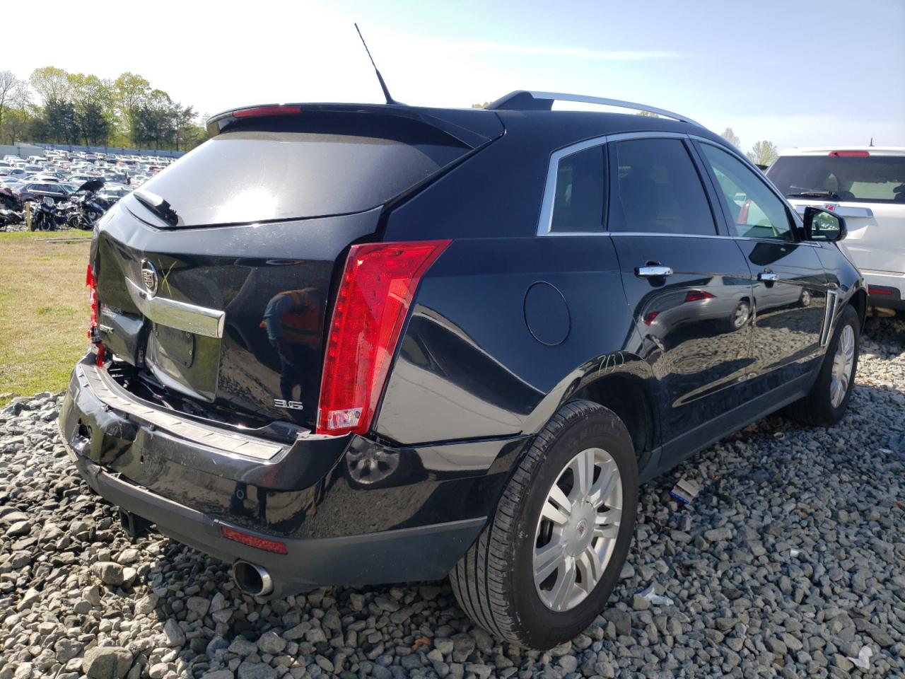 Photo 4 from auction – 2013 CADILLAC SRX with VIN 3GYFNCE32DS585317