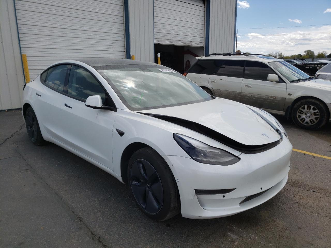 TESLA MODEL 3 2021 with VIN 5YJ3E1EA5MF868072 - Photo from auction