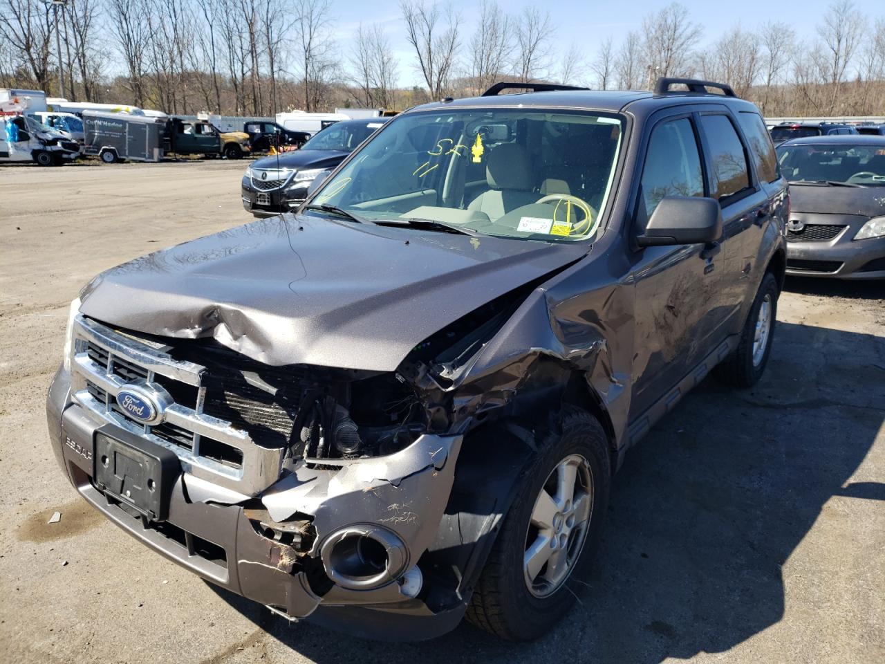 Photo 2 from auction – 2011 FORD ESCAPE XLT with VIN 1FMCU0DG9BKA72701