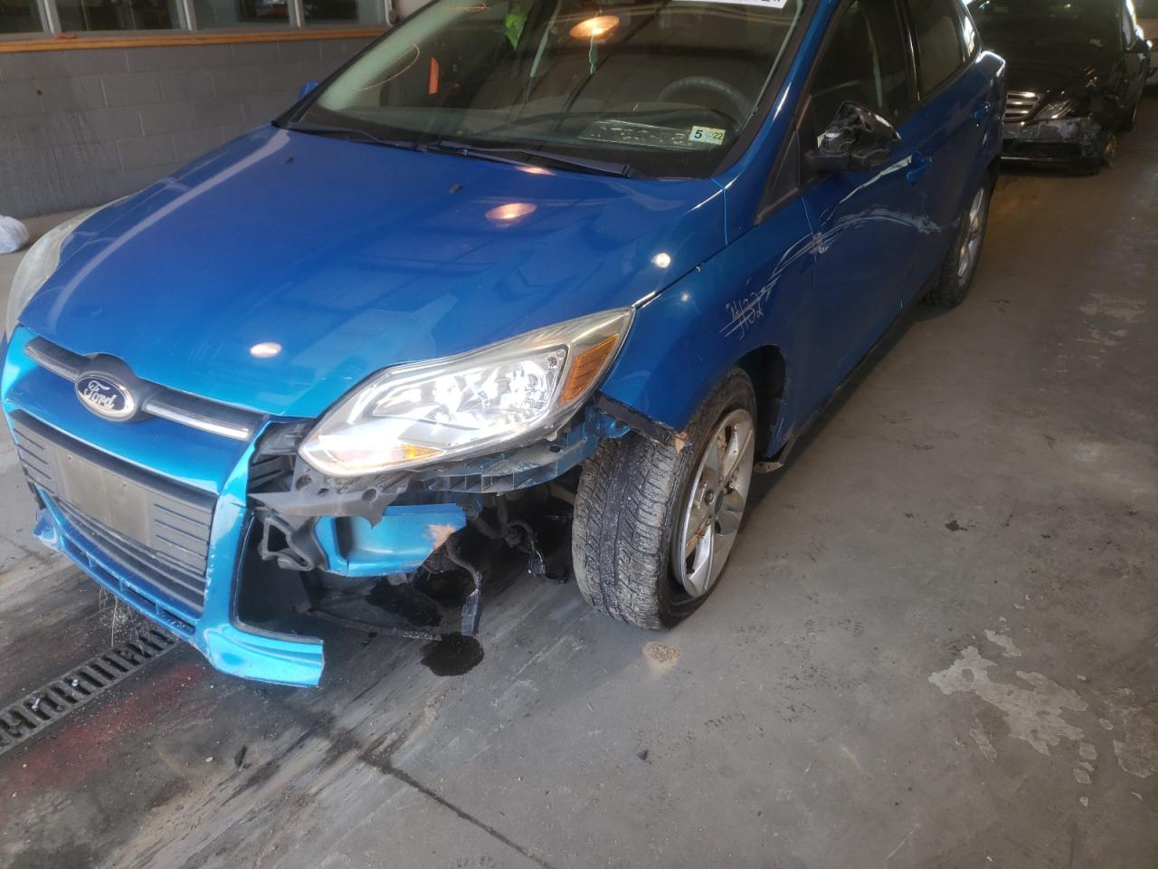 Photo 9 from auction – 2013 FORD FOCUS SE with VIN 1FADP3F20DL269987