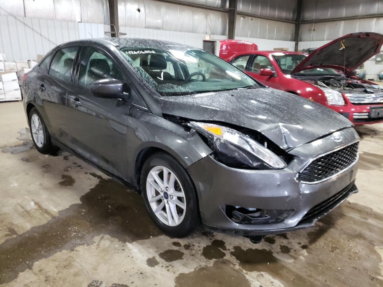 FORD FOCUS SE 2018 with VIN 1FADP3F2XJL267045 - Photo from auction