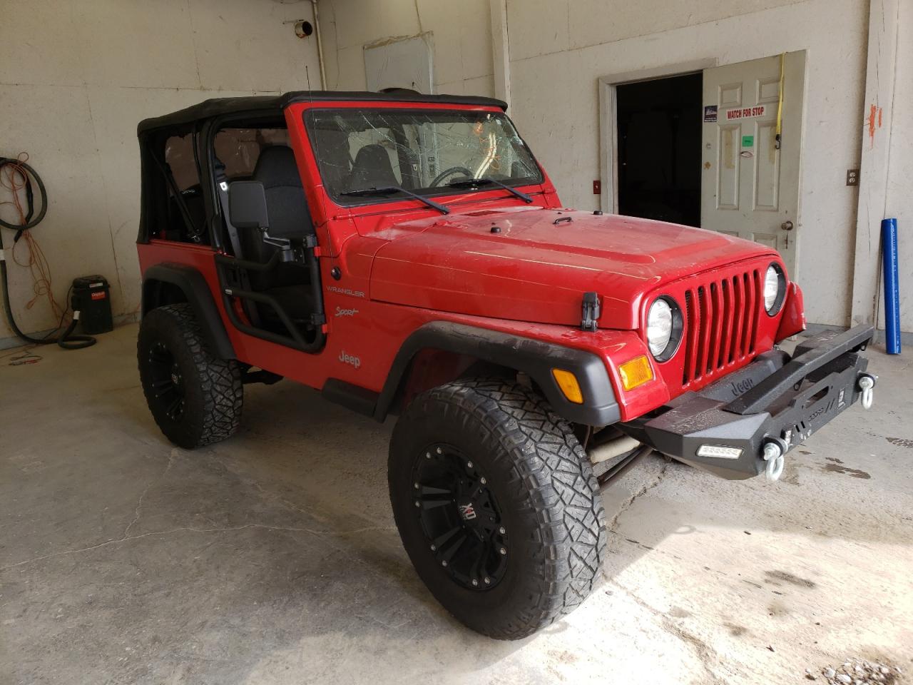 JEEP WRANGLER / 2002 with VIN 1J4FA49S32P714910 - Photo from auction