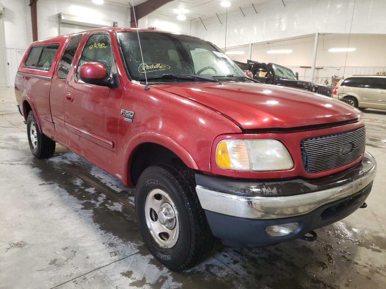 FORD F150 2002 with VIN 1FTRX18W22NA77332 - Photo from auction