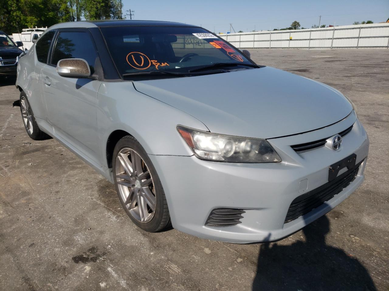 TOYOTA SCION TC 2011 with VIN JTKJF5C73B3014803 - Photo from auction