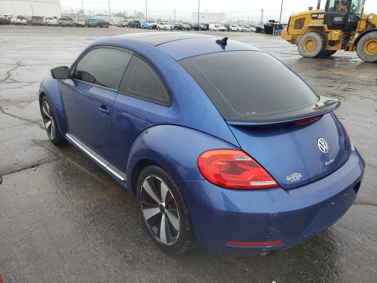 Photo 3 from auction – 2013 VOLKSWAGEN BEETLE TUR with VIN 3VWVA7AT2DM621292