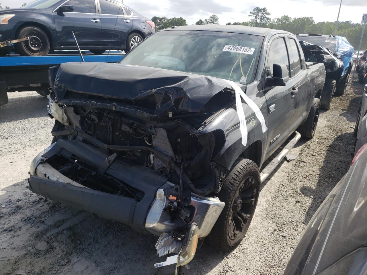 Photo 2 from auction – 2014 TOYOTA TUNDRA DOU with VIN 5TFRY5F16EX152036