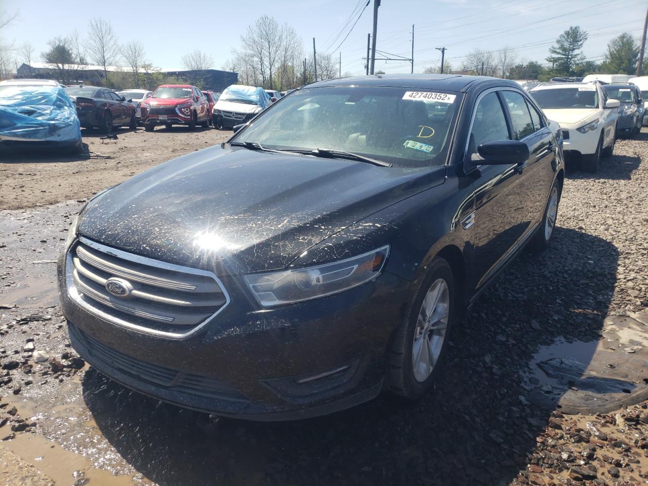 Photo 2 from auction – 2014 FORD TAURUS SEL with VIN 1FAHP2E85EG173834