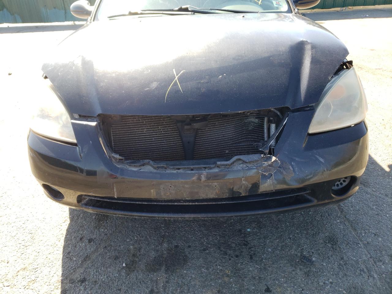 Photo 9 from auction – 2002 NISSAN ALTIMA BAS with VIN 1N4AL11E82C243221