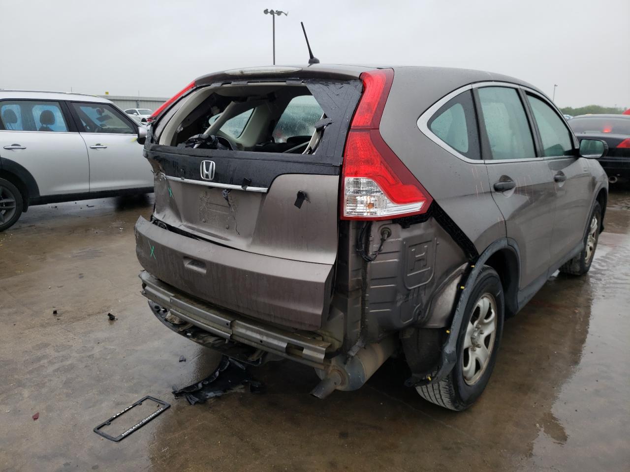 Photo 4 from auction – 2012 HONDA CR-V with VIN 5J6RM3H33CL034202