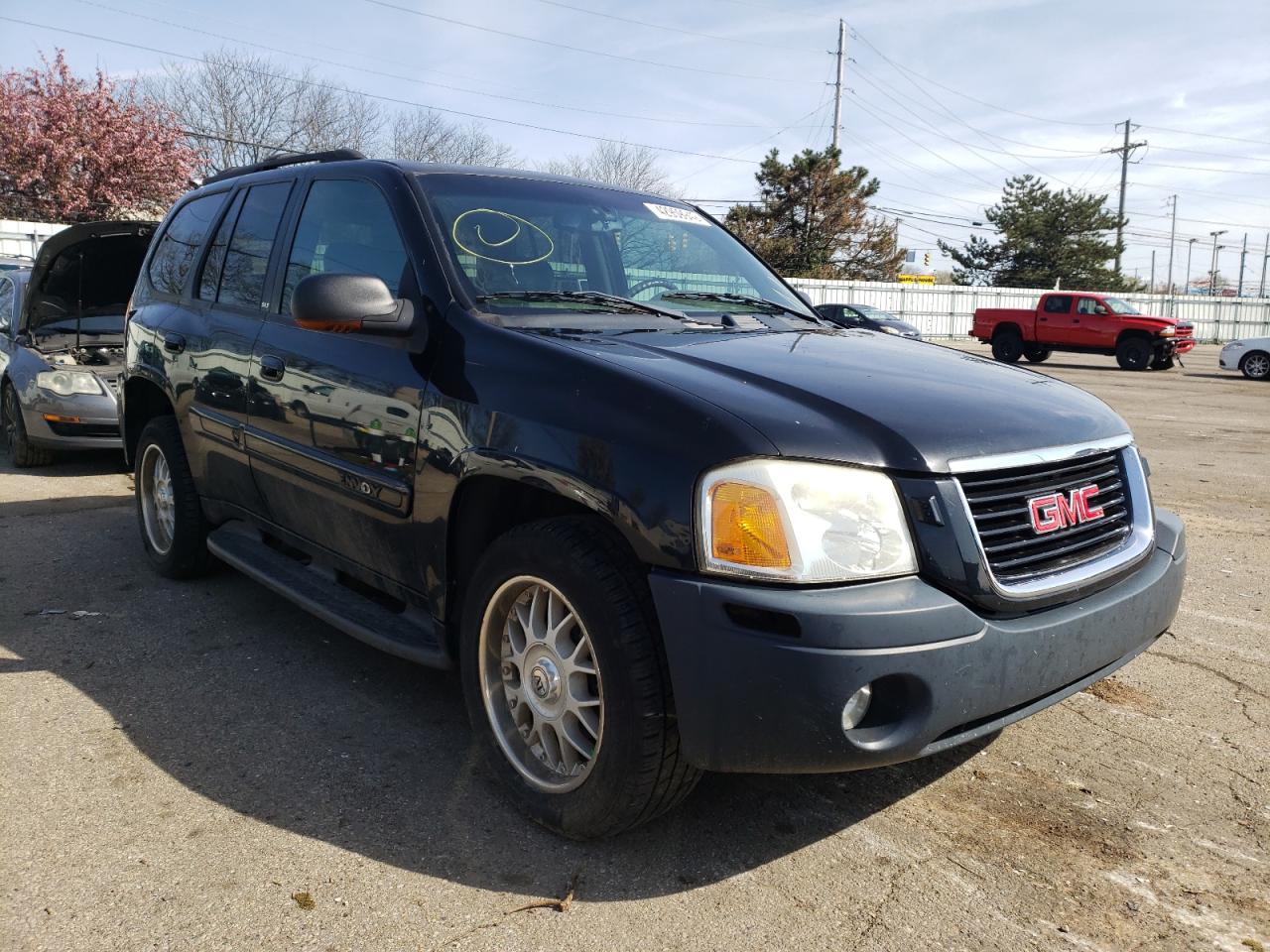 GMC ENVOY 2002 with VIN 1GKDT13S922403644 - Photo from auction
